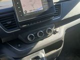 the dashboard of a car with a gps device on the dashboard