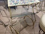 a table with a magazine rack on it and a chair