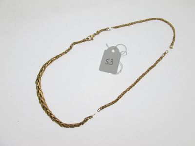 a close up of a necklace with a price tag on it