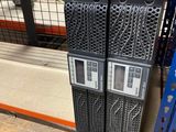 many racks of computer equipment in the store for sale