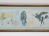 a picture of a painting of cows on the wall