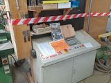 a machine that is sitting inside of a building