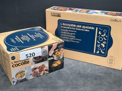 boxes of food are sitting on a table next to a box of cookies