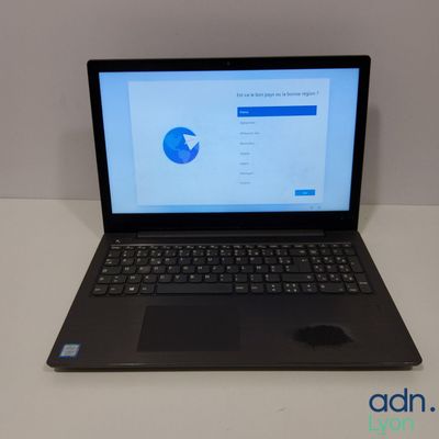 an open laptop computer sitting on top of a white table