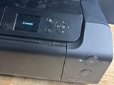 the printer is sitting on the table ready to be used