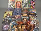 many comic books are stacked on top of each other on a table
