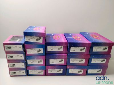several boxes are stacked on top of each other on a table