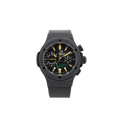 a close up of a watch on a white background