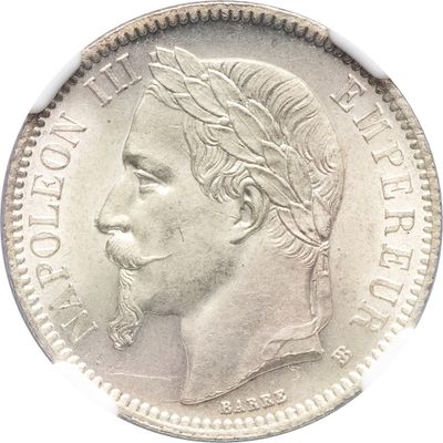 Gros plan sur une pièce de monnaie portant le visage d'un homme