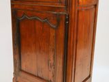 an old wooden cabinet with a drawer on one side and a drawer on the other side
