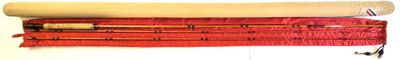 a roll of red fabric next to a roll of yellow fabric