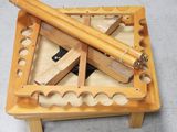 a wooden table with a telescope on top of it