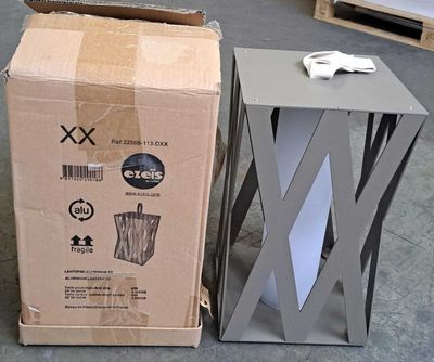 a cardboard box and a cardboard box with scissors on it