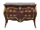 a chest of drawers with a marble top and gold decoration
