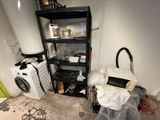 an image of a room with a washing machine and a dryer