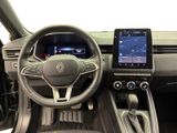 a picture of the interior of a car with a touch screen