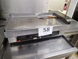 une photo d'un four à pizza de comptoir sur lequel figure le chiffre 58