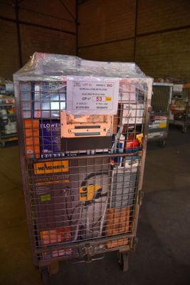 a cart with a lot of items in it in a warehouse