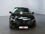 a picture of a black toyota camry parked in a showroom
