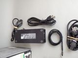 a picture of a laptop and other electronics on a wall