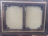 a picture of an old window with a broken glass