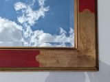 a picture of a reflection of a sky in a mirror