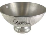 an image of a large silver bowl with the word champagne