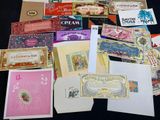 many cards and envelopes laid out on a table