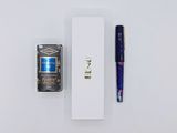 a cigarette and a lighter sitting next to each other