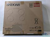 a cardboard box with a picture of an electrical device inside of it