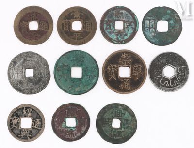 an image of a group of old chinese coins on a white surface