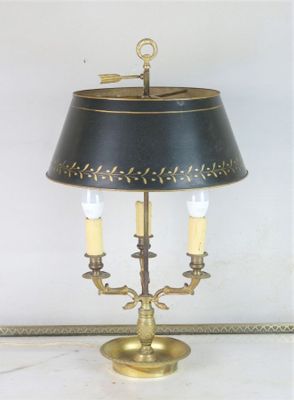 a lamp that is sitting on a table with a lamp on it