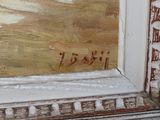 a painting on the wall of a building with writing on it