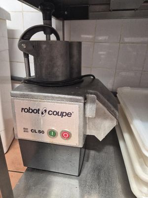 a machine that is sitting on a counter in a kitchen