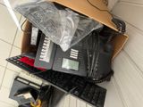 a box with a keyboard, a keyboard, and a keyboard in it
