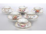 six pieces of porcelain tea set with saucers and saucers