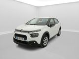 une voiture blanche de marque Citrole dans une pièce blanche