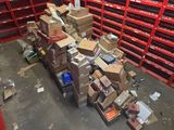 many boxes stacked on top of each other in a warehouse