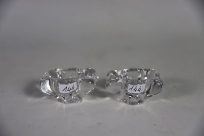 pair of silver plated sugar and creamers on a white surface