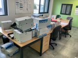 many boxes on the desk in the office