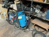 a lot of junk on the floor in the garage