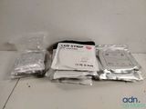 a package of hard drives sitting on the floor