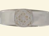 an image of a silver ring with a white stone in the center