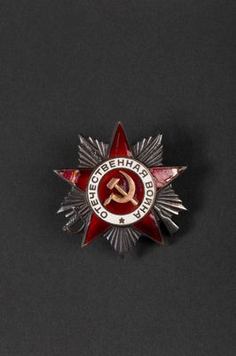 a close up of a badge with a star on it