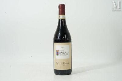 a bottle of wine that is sitting on a table