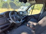 a view of the inside of a vehicle from the driver ' s seat
