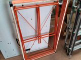 a picture of a room with a ladder and a cabinet