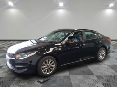 a picture of a black car parked on a checkered floor