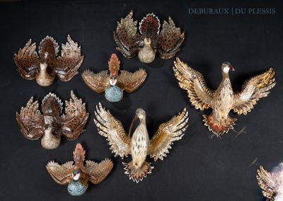 a lot of birds that are sitting on a table