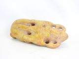 a piece of bread that has holes in it